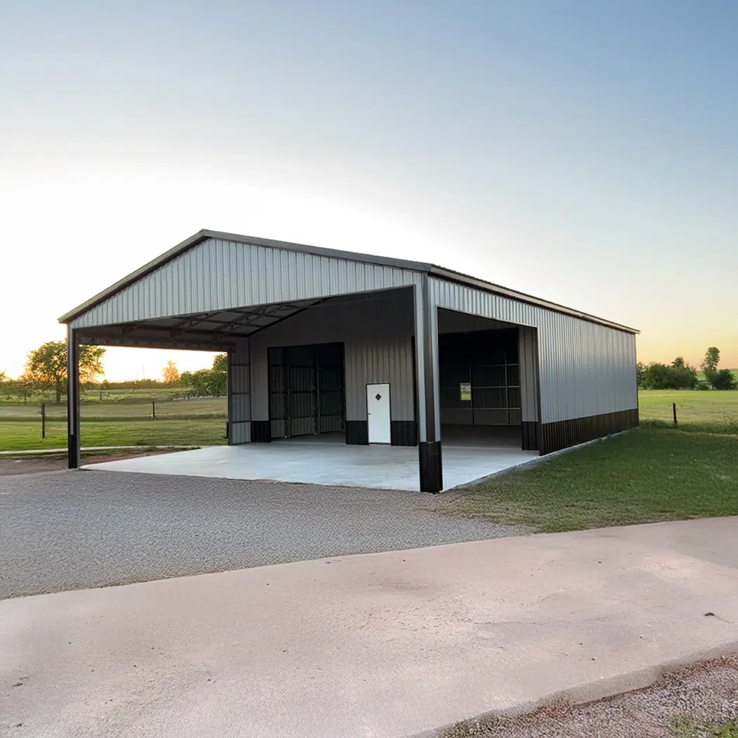 40x50x14 commercial shop metal building with open bay and enclosed storage area on concrete foundation.